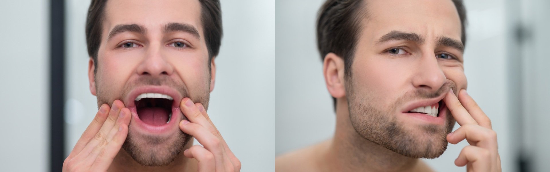 A man checking his mouth for signs of oral cancer in the mirror