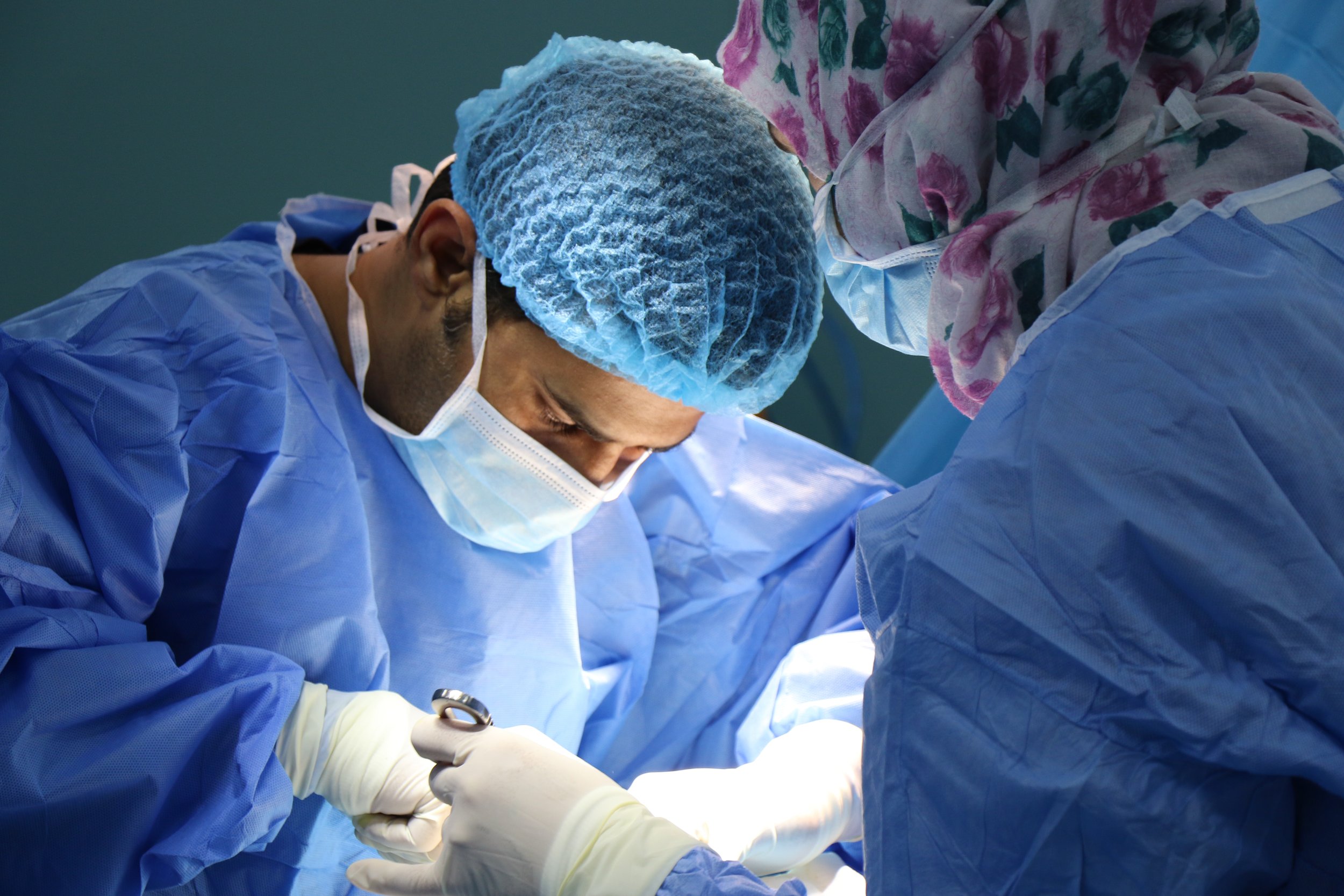 Maxillofacial surgeons operating on the head and neck area